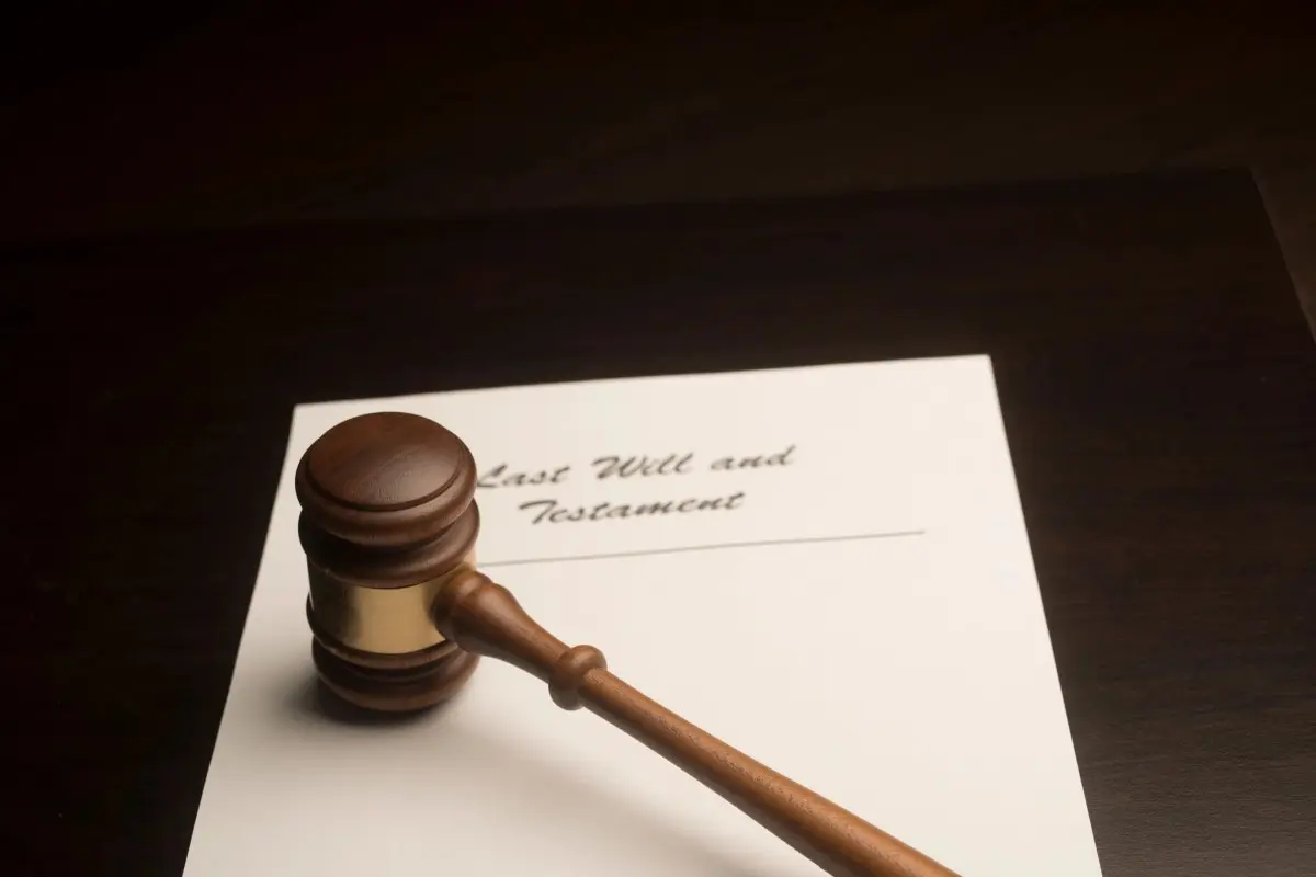 A judge 's gavel on top of an application.